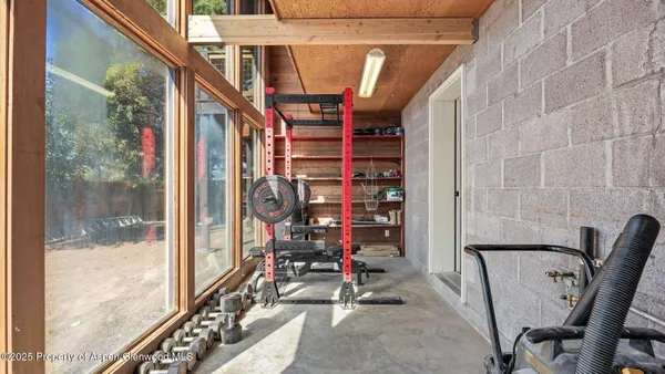 a view of a room with gym equipment
