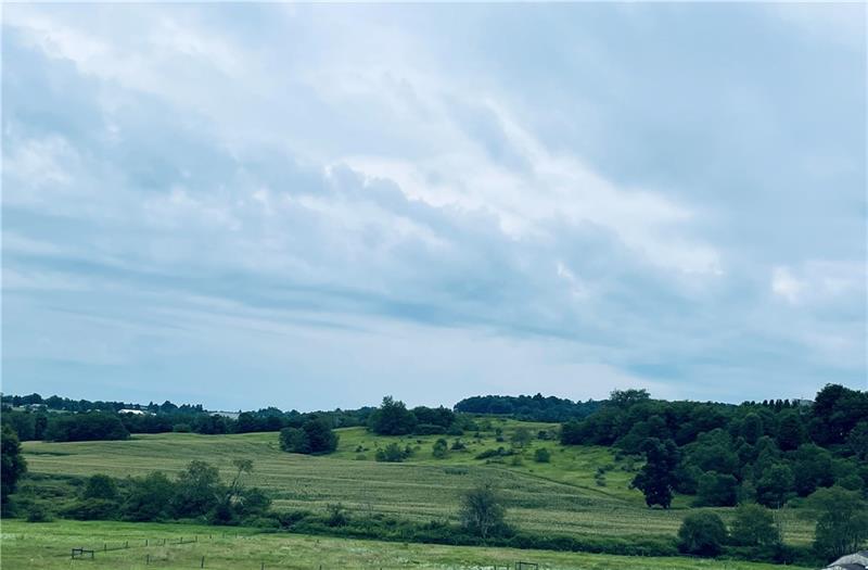 Lot 7 Beaver Hollow Road Somerset, PA 15501 - Photo 3 of 9 a view of a city with lush green forest
