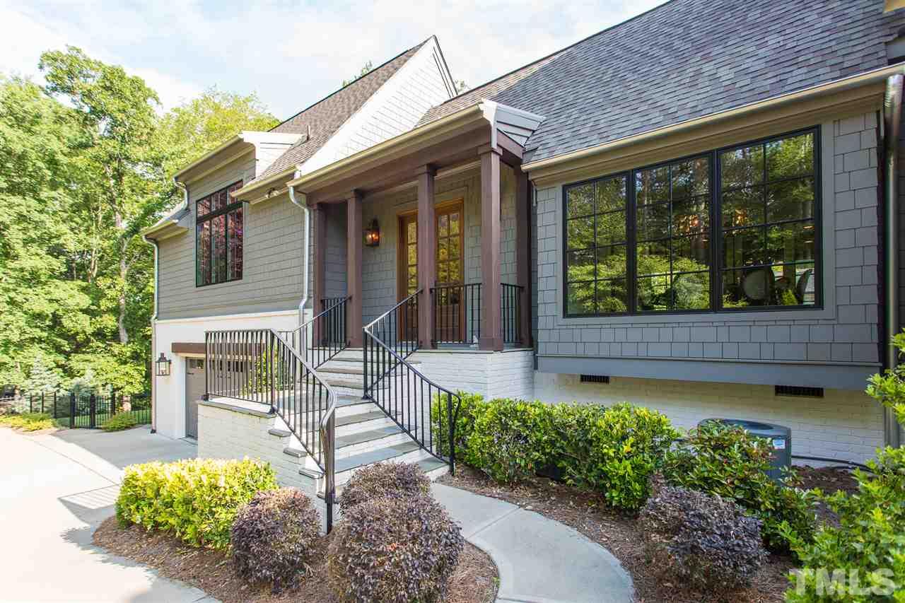 1613 Ridge Road Raleigh, NC 27607 - Photo 2 of 30 a front view of a house with garden