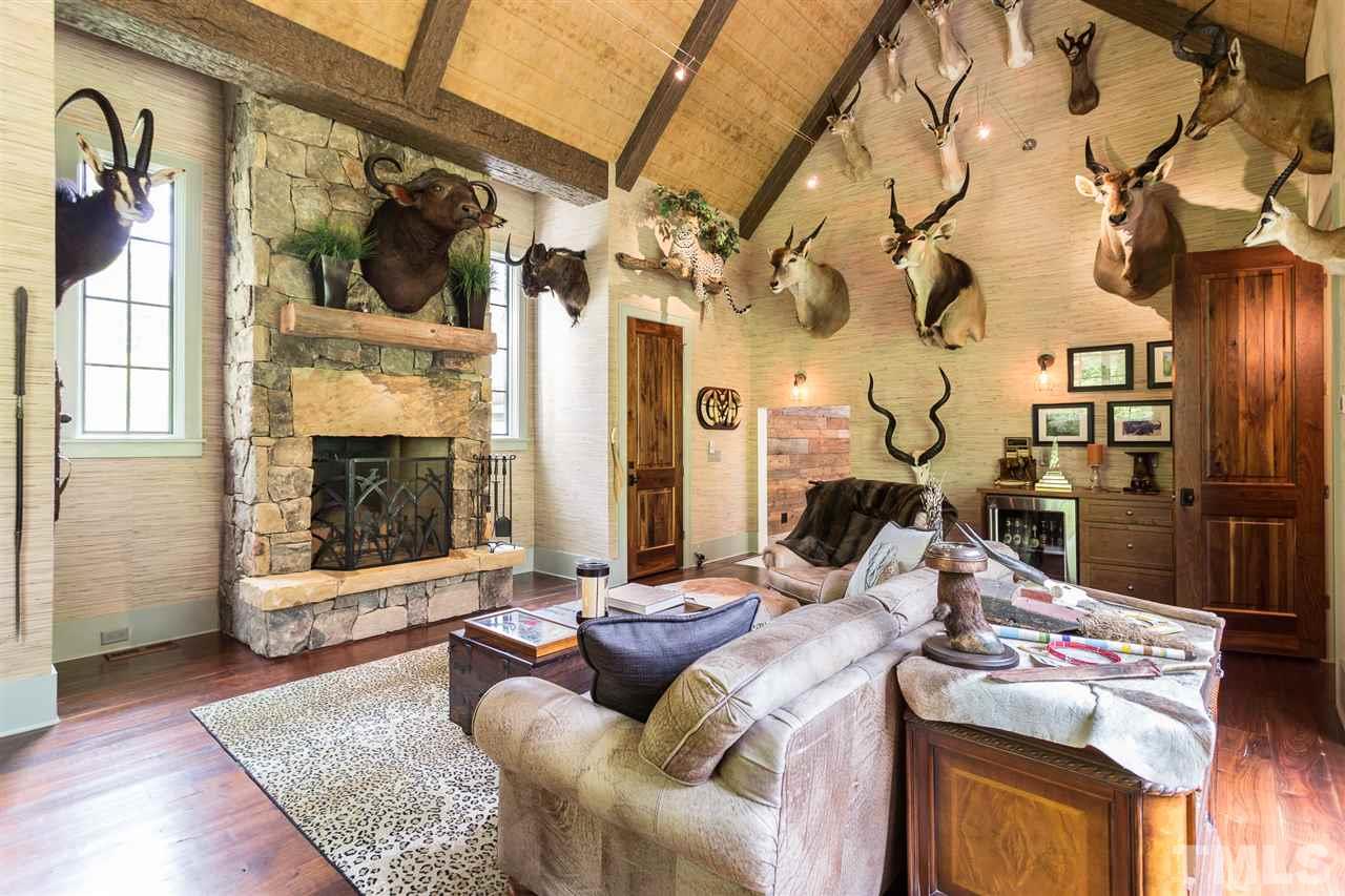 1613 Ridge Road Raleigh, NC 27607 - Photo 15 of 30 a living room with fireplace furniture and a fireplace