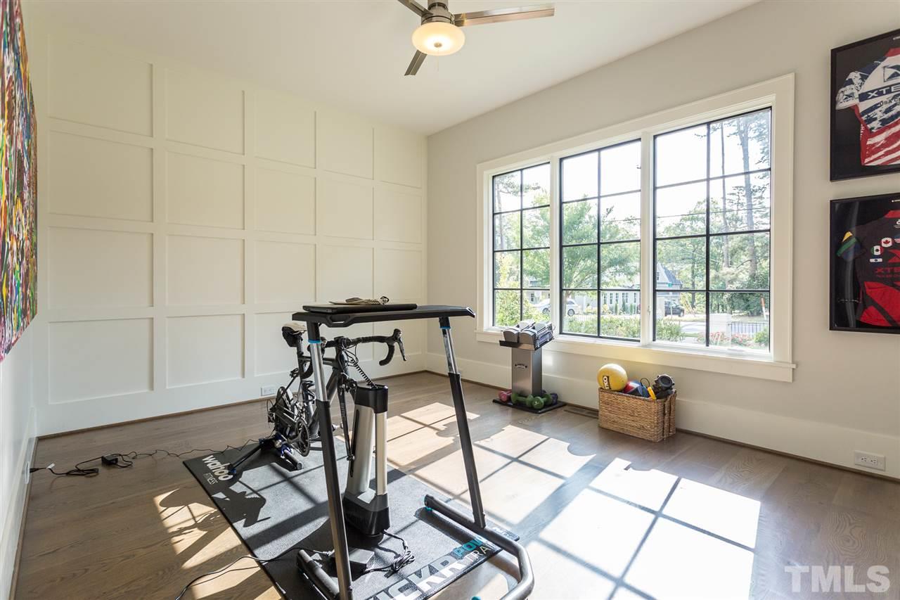 1613 Ridge Road Raleigh, NC 27607 - Photo 16 of 30 a view of a workspace with furniture and a window