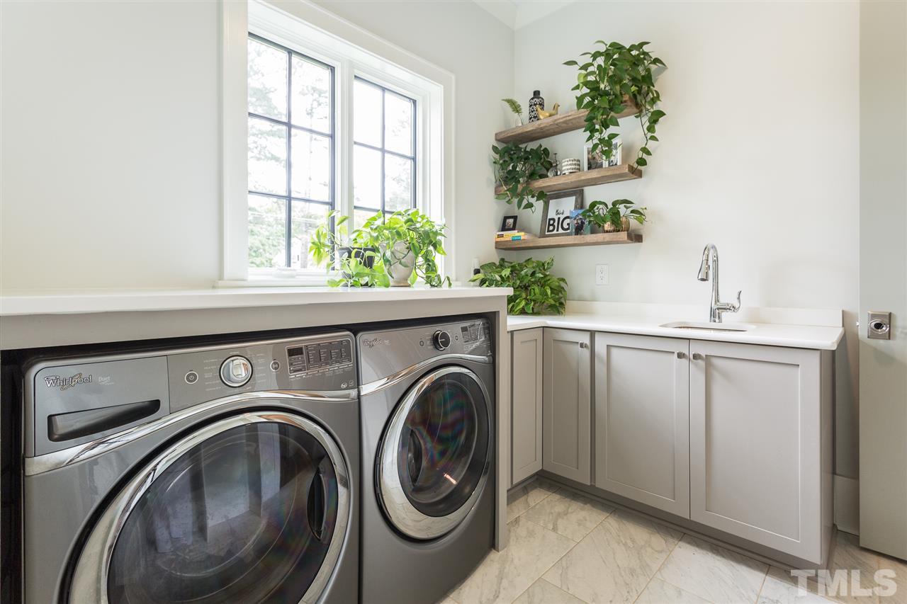 1613 Ridge Road Raleigh, NC 27607 - Photo 18 of 30 a utility room with dryer and washer