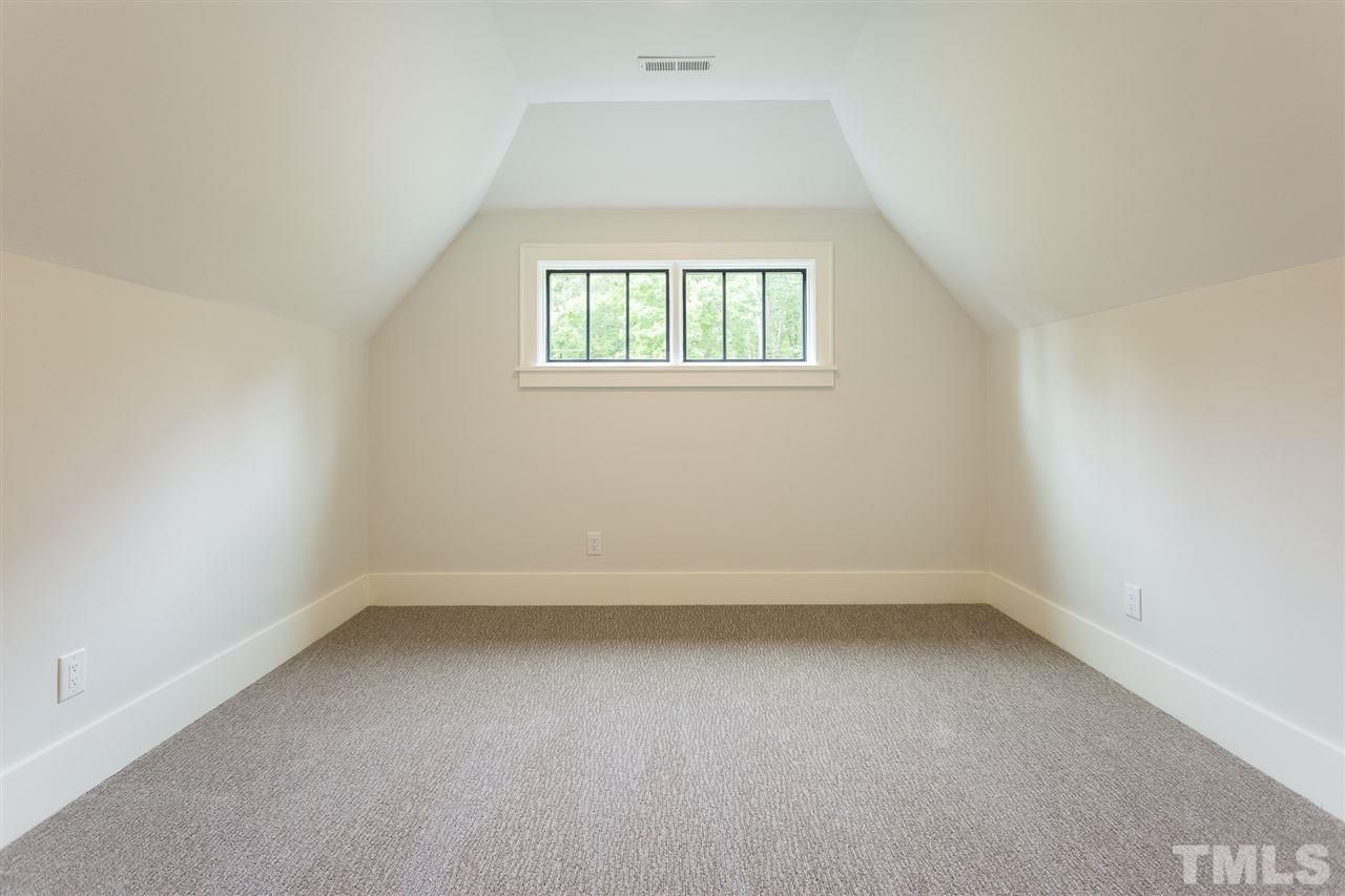 1613 Ridge Road Raleigh, NC 27607 - Photo 25 of 30 an empty room with a window