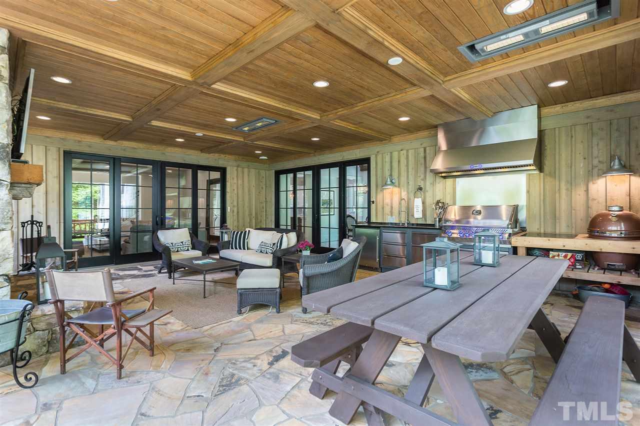 1613 Ridge Road Raleigh, NC 27607 - Photo 5 of 30 a outdoor space with lots of tables a large window and chairs