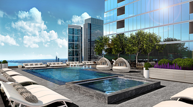 363 East Wacker Drive, Unit 7501 Chicago, IL 60601 - Photo 5 of 15 a swimming pool with barbeque oven table and chairs