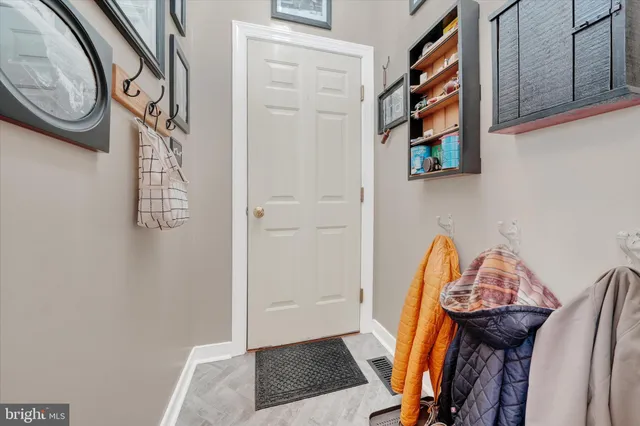 a view of a hallway with entryway