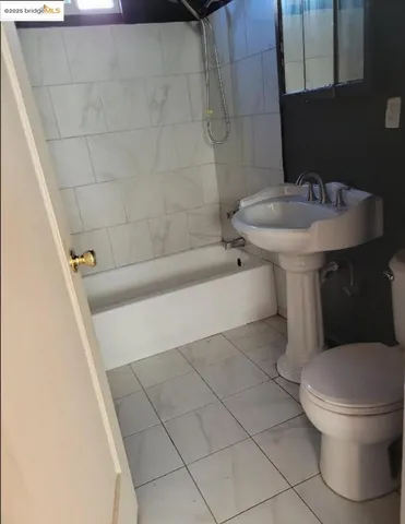 a view of a backyard with sitting area