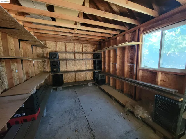 a view of a brick house with wooden floor