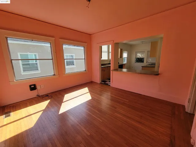 a kitchen with a sink a stove a microwave and cabinets