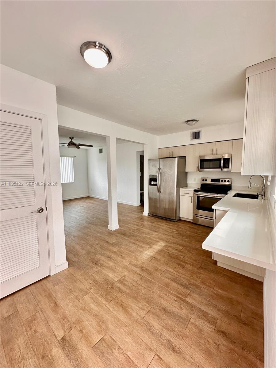 4203 Southwest 15th Street, Unit 2 Miami, FL 33145 - Photo 10 of 17 a view of a kitchen with a sink