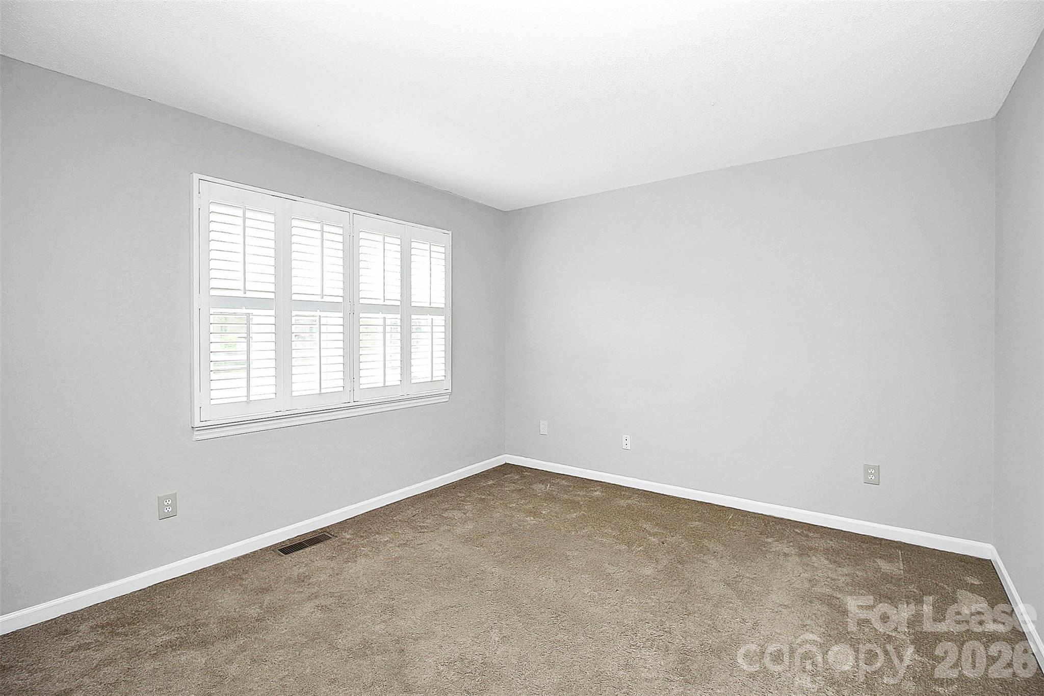 11111 Park Road Charlotte, NC 28226 - Photo 6 of 9 an empty room with a window