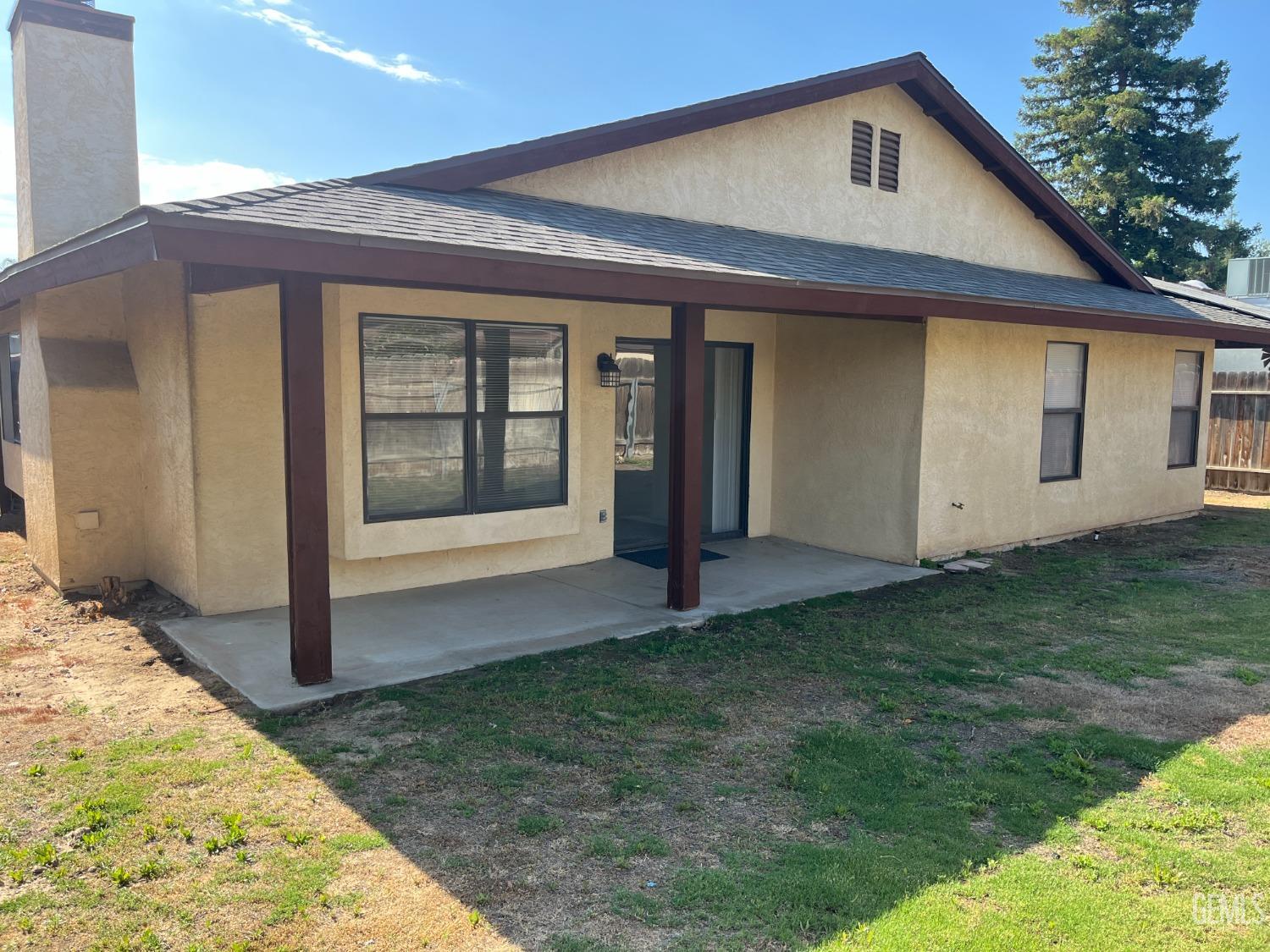 Undisclosed Address Bakersfield, CA 93311 - Photo 12 of 12 a view of a house with backyard