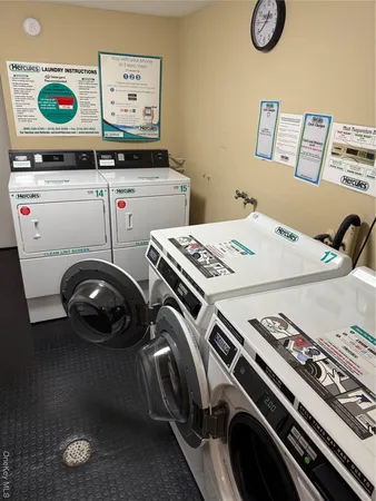 a utility room with dryer and washer