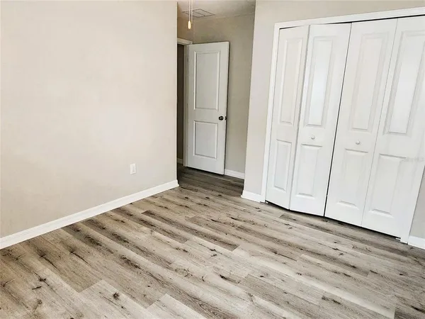 a view of a livingroom with wooden floor