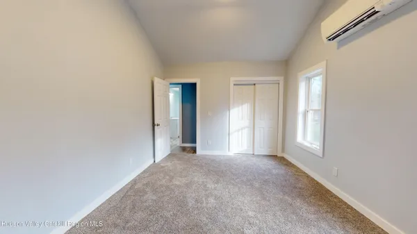 a view of a window in an empty room