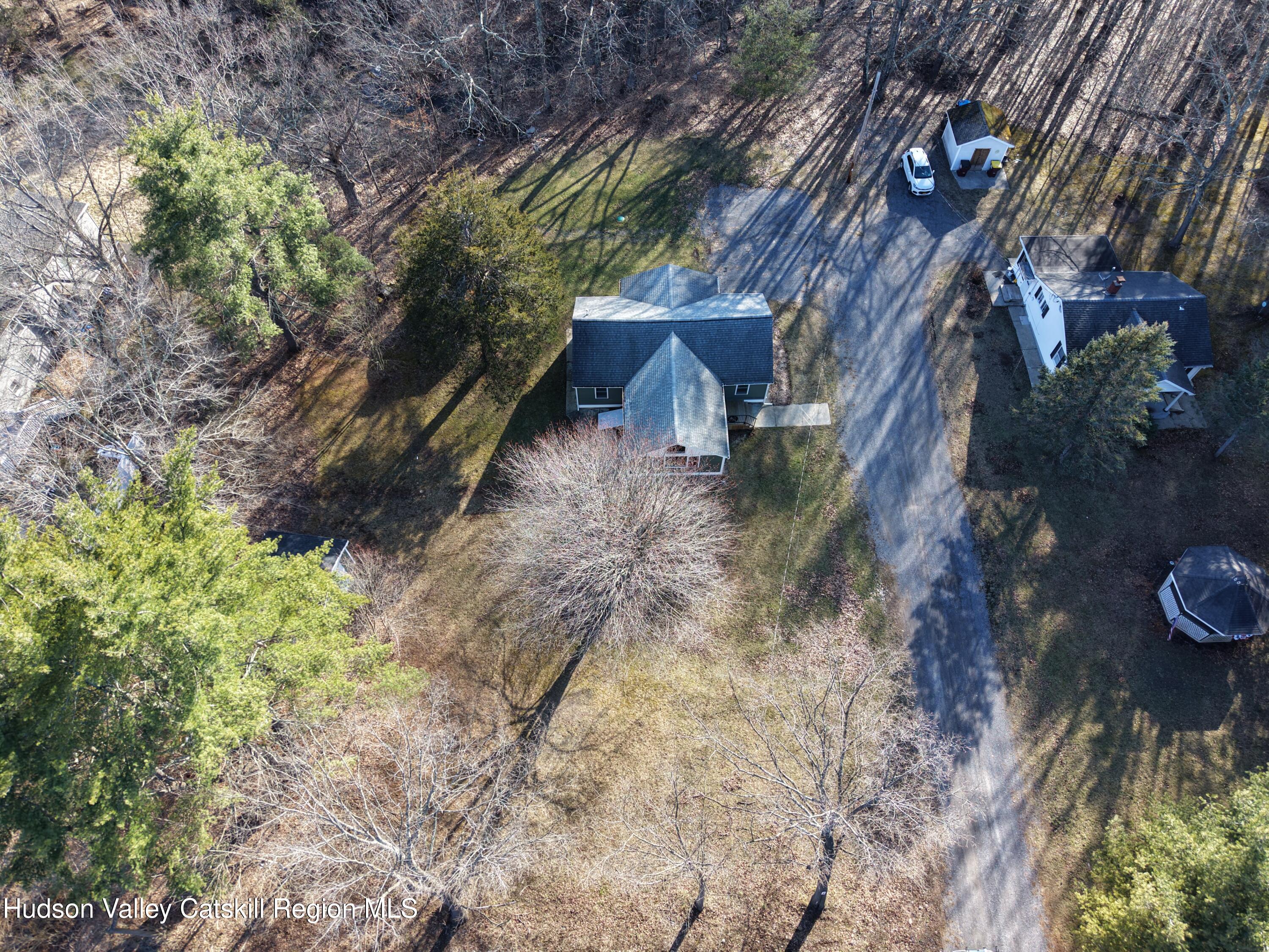 79 Highway 145 Cairo, NY 12413 - Photo 21 of 23 a view of a house with a yard