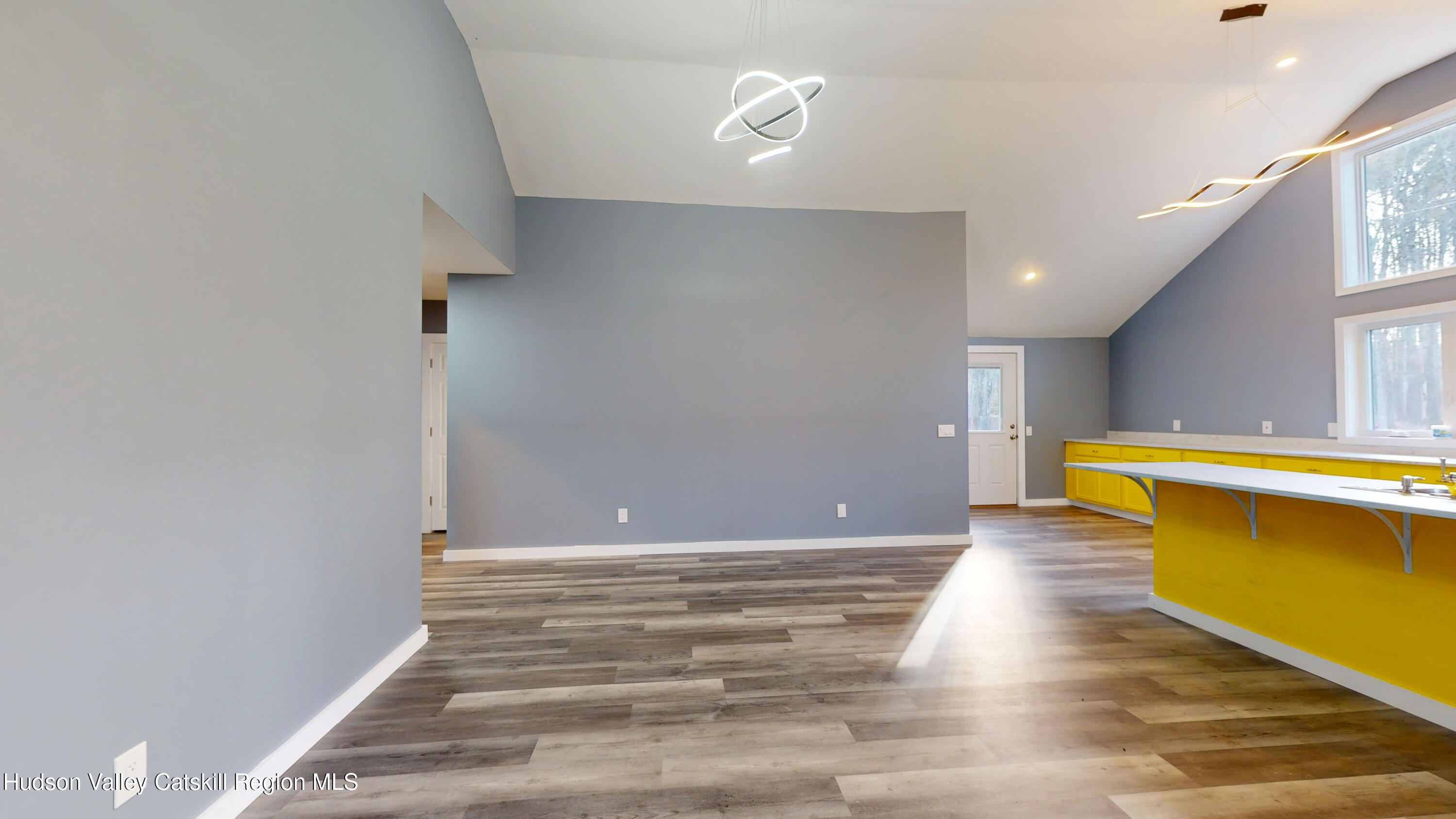 79 Highway 145 Cairo, NY 12413 - Photo 6 of 23 a view of an empty room with wooden floor and a window