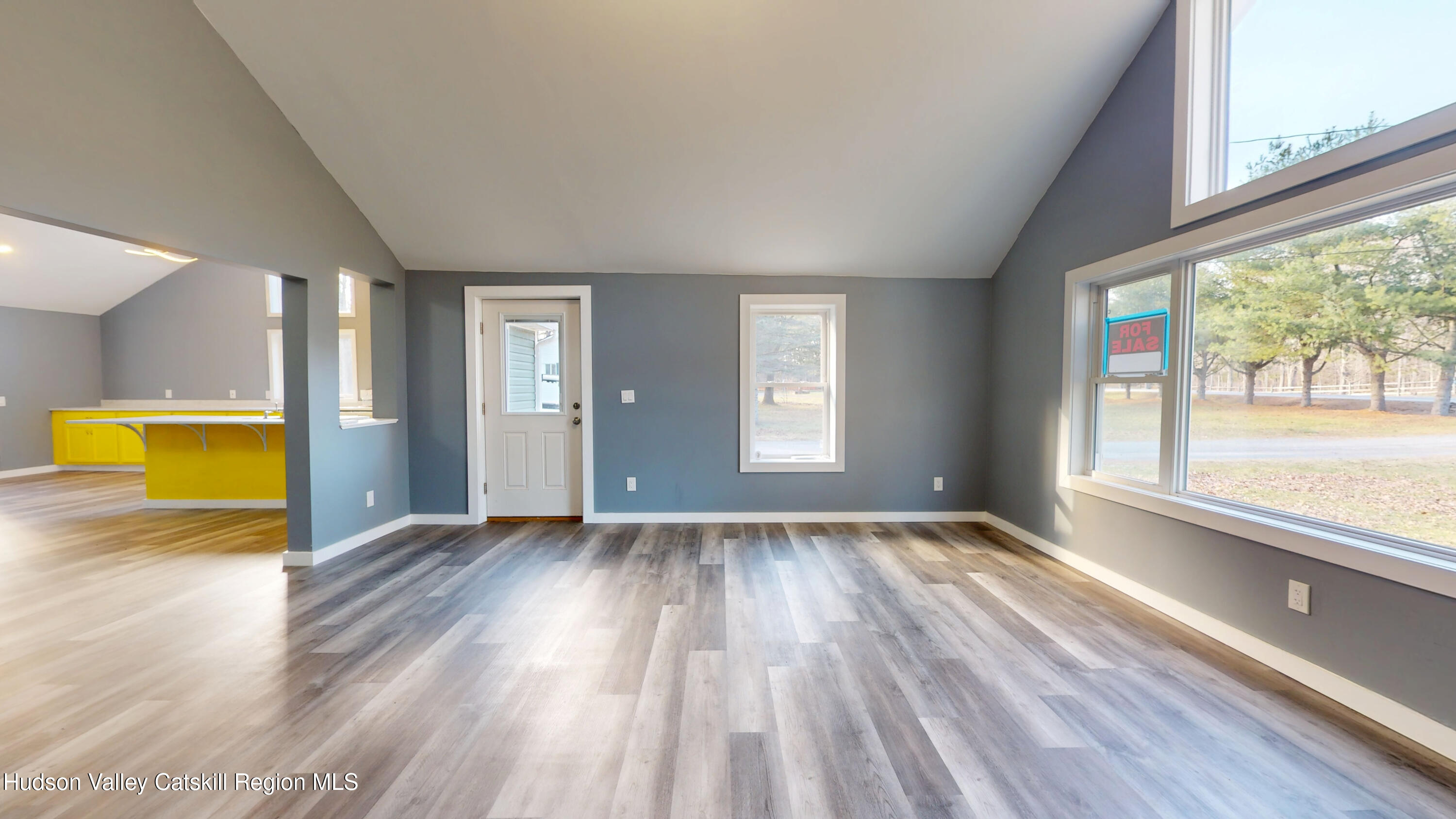 79 Highway 145 Cairo, NY 12413 - Photo 8 of 23 a view of an empty room with a window and wooden floor