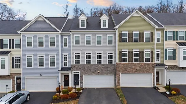 a front view of multiple houses