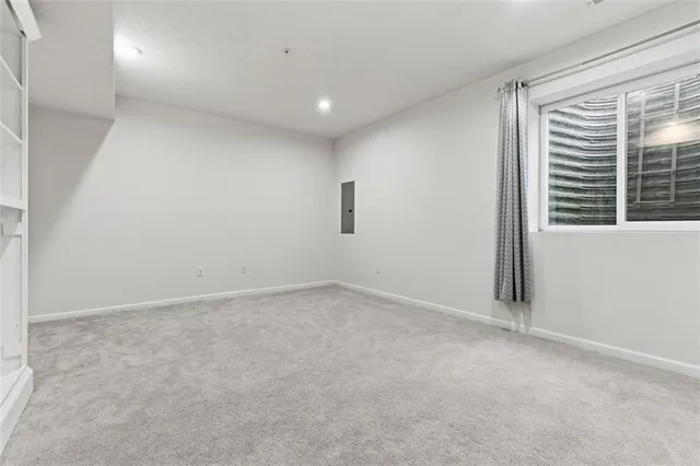 en empty room with windows