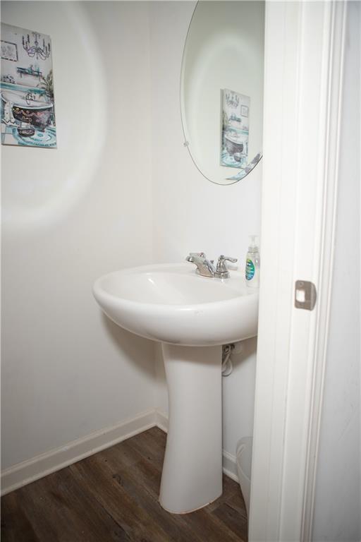 11900 Fuller Street Hampton, GA 30228 - Photo 7 of 17 a bathroom with a sink and a mirror