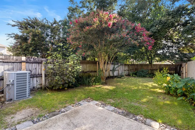 a backyard of a house with lots of green space
