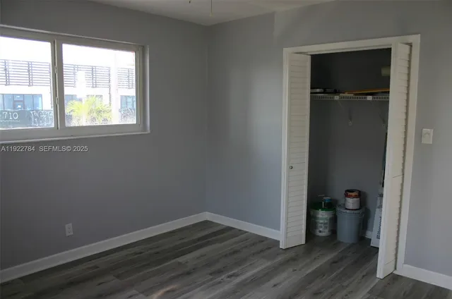 an empty room and a window