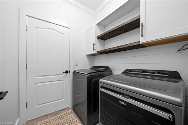 a kitchen with a stove and a microwave