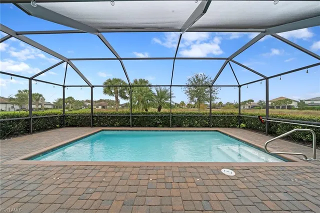 a view of a backyard of the house