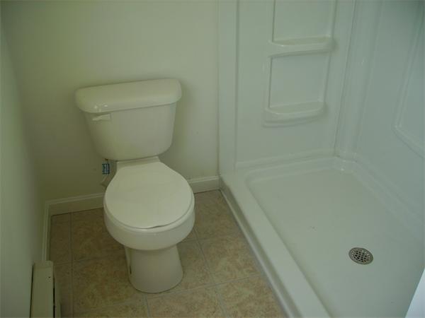 633 Plantation Street Worcester, MA 01605 - Photo 21 of 24 a bathroom with a toilet and a sink