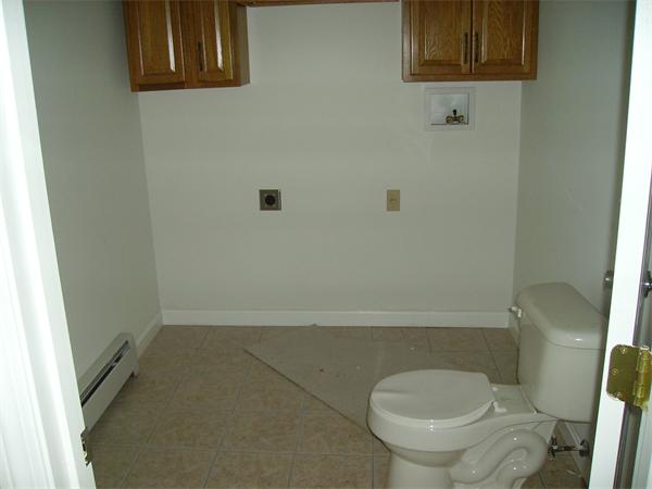 633 Plantation Street Worcester, MA 01605 - Photo 22 of 24 a bathroom with a toilet and a shower