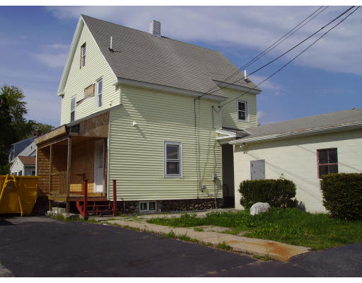 633 Plantation Street Worcester, MA 01605 - Photo 3 of 24 a view of a house with a yard