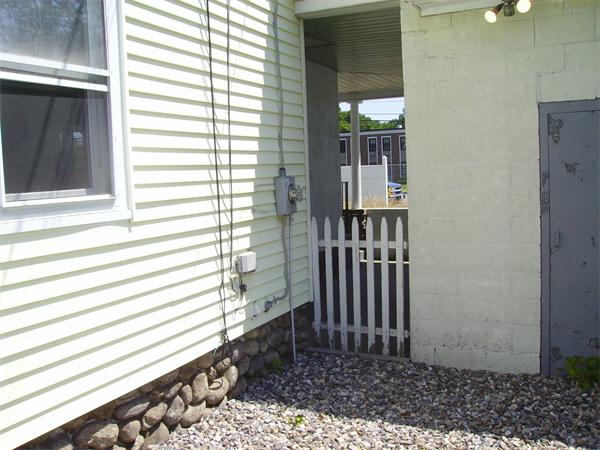 633 Plantation Street Worcester, MA 01605 - Photo 4 of 24 a view of a house with a door and wooden floor