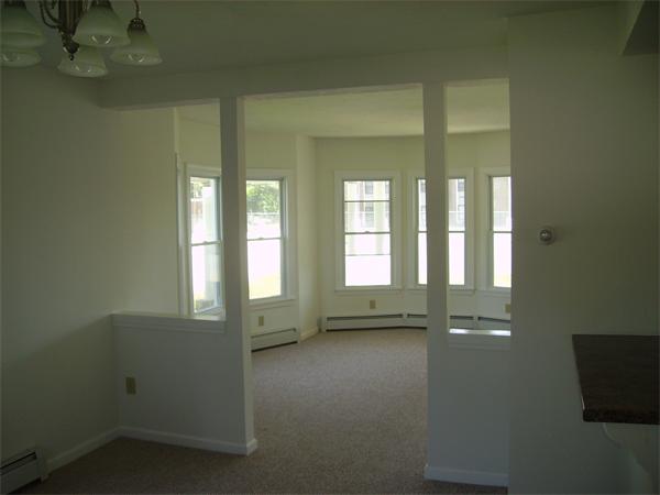 633 Plantation Street Worcester, MA 01605 - Photo 8 of 24 an empty room with windows