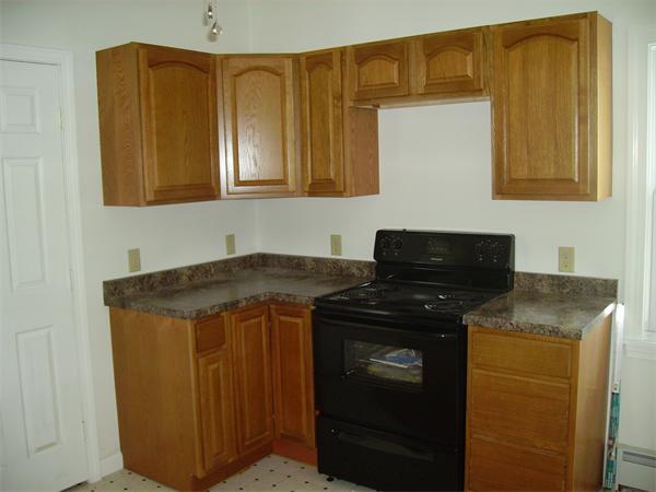 633 Plantation Street Worcester, MA 01605 - Photo 10 of 24 a kitchen with a sink and cabinets