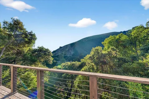 a view of a balcony with an outdoor space