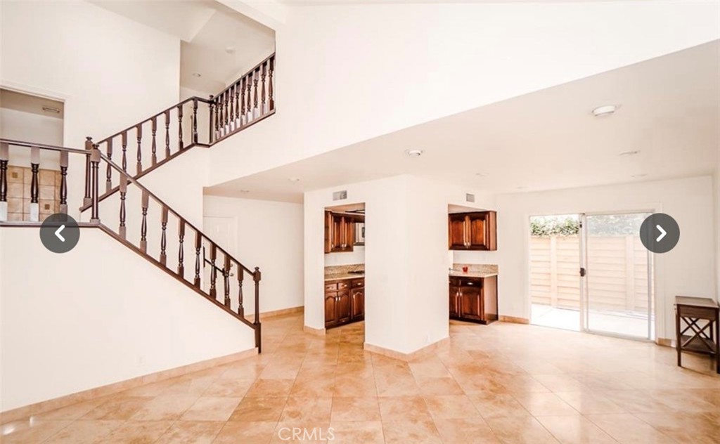 9846 California South Gate, CA 90280 - Photo 2 of 9 a view of a livingroom with a staircase