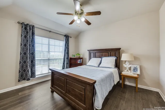 a bed room with a bed and a window