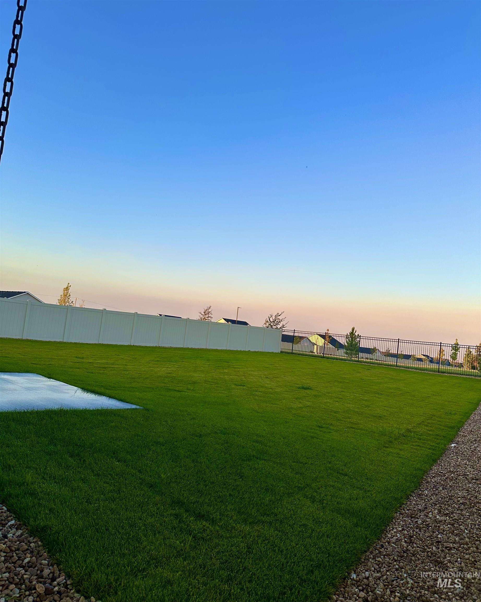15402 Nimbus Way Caldwell, ID 83607 - Photo 9 of 9 View of yard at dusk