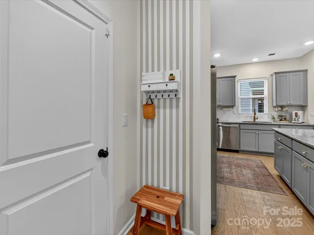 a view of a kitchen with electric appliances