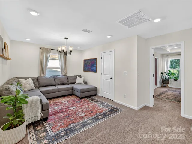 a living room with furniture or couch and a window