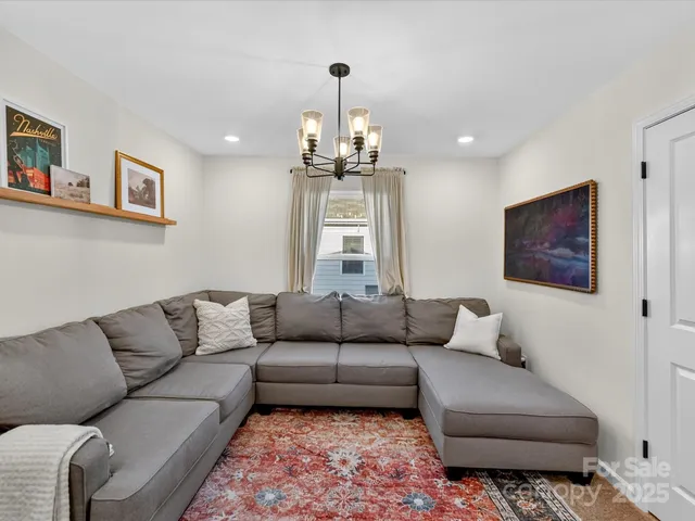 a bedroom with a bed and a mirror