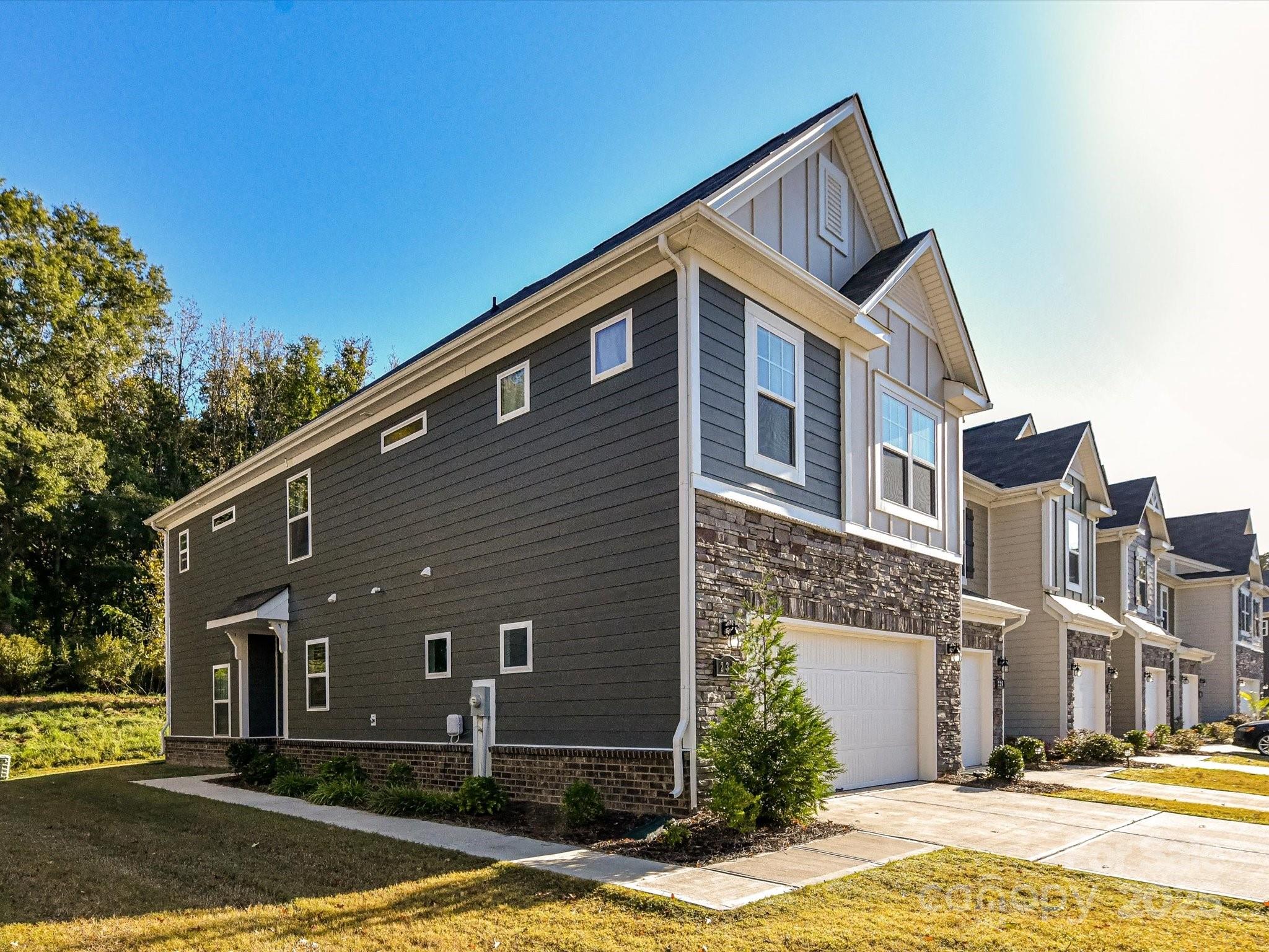 230 Quinn Road Matthews, NC 28104 - Photo 2 of 35 a view of a house with a patio