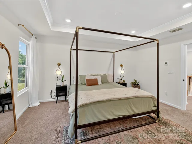 a bathroom with a double vanity sink mirror and a toilet