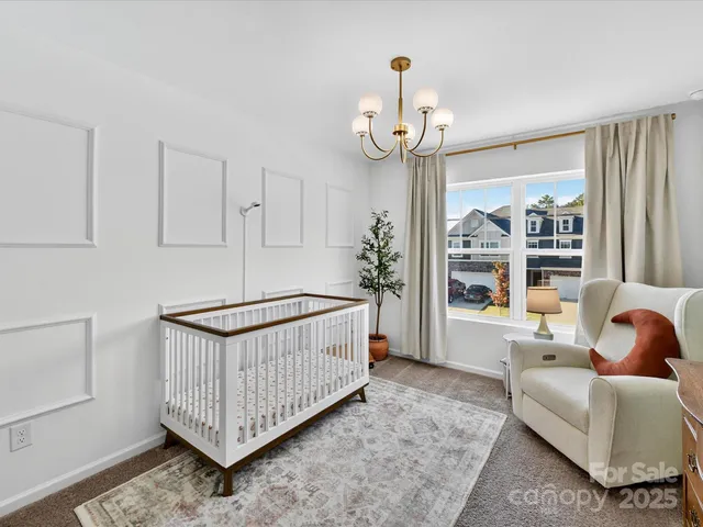 a view of hallway with furniture