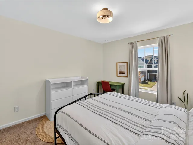 a bathroom with a double vanity sink and mirror