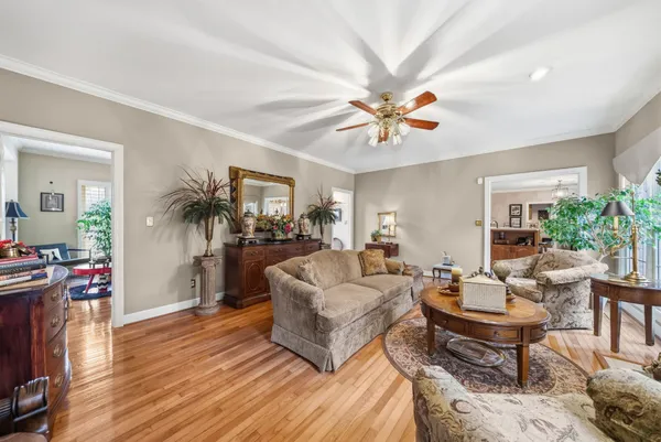 a kitchen with stainless steel appliances granite countertop sink stove top oven and cabinets
