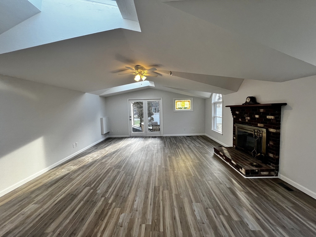6 Mayfield Road Auburn, MA 01501 - Photo 15 of 30 wooden floor in an empty room with a window