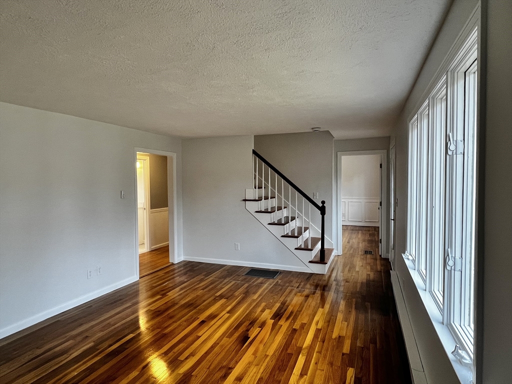 6 Mayfield Road Auburn, MA 01501 - Photo 20 of 30 a view of an entryway with wooden floor