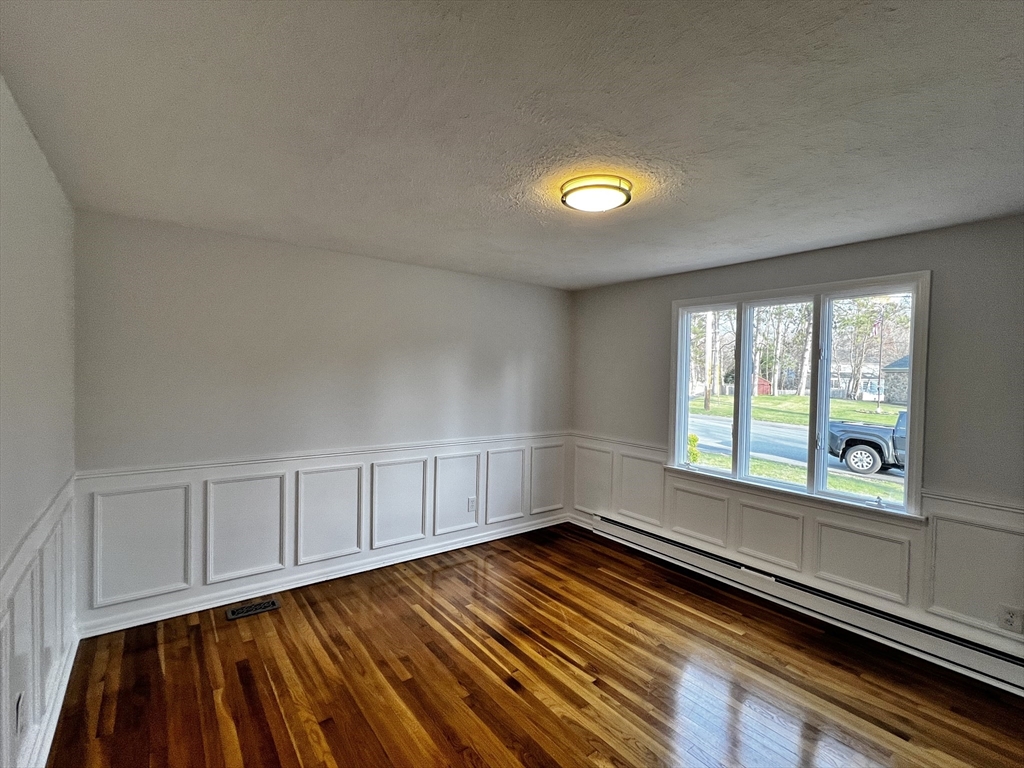 6 Mayfield Road Auburn, MA 01501 - Photo 23 of 30 a view of an empty room with a window